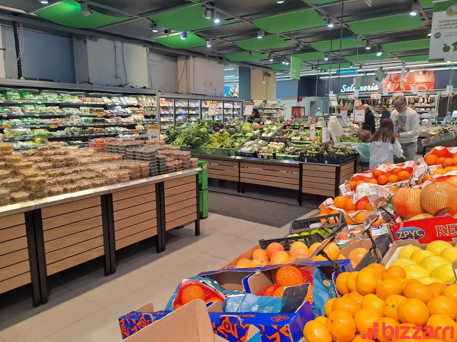 Retail shelving and specialised stands with wooden slat finish for fruit and vegetable departments