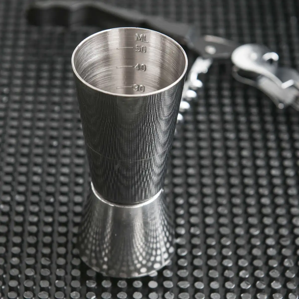 Двусторонний мерный стакан 0,025 - 0,05 л.